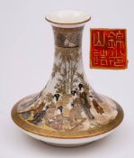 A Japanese satsuma vase by Kinkozan: the trumpet-shaped body finely decorated with a continuous