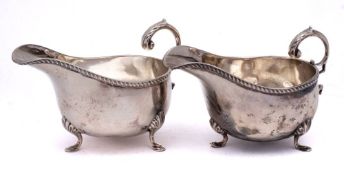 A pair of Edward VII silver sauceboats, maker William Aitken, Birmingham,