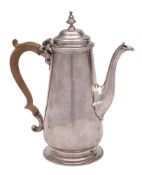 A George II silver coffee pot, maker CW probably Charles Woodward, London,