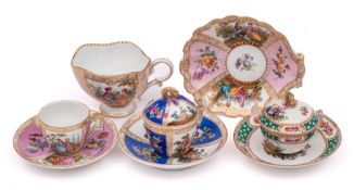 A group of Continental porcelain cups and saucers: comprising a Dresden shell-shaped example,