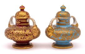 Two Royal Crown Derby porcelain vases and covers: of squat form the handles terminating with masks,