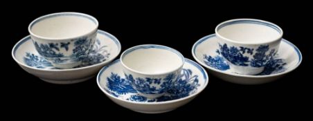A group of three First Period Worcester blue and white toy tea bowls and saucers: transfer printed