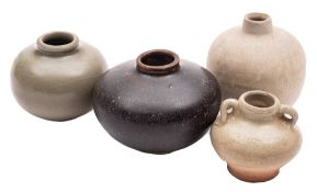 A Chinese brown glazed squat globular jar and three similar celadon glazed jars: the smallest with