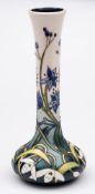WITHDRAWN A Moorcroft pottery limited edition vase: of squat form with slender waisted neck tube