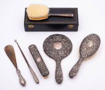 A mixed lot of silver wares, various makers and dates: includes hair brushes, hand mirror,