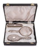 An Elizabeth II silver backed dressing table set, maker W I Broadway & Co, Birmingham,