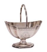 A George III silver swing handled sugar basket, maker Robert Hennell I and David Hennell II, London,