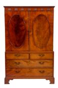 A George III mahogany linen press, circa 1800,