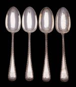 A set of four Victorian silver bead pattern tablespoons, maker H J Lias & Son, London, 1869: 321gms,