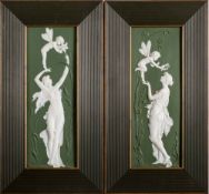 A pair of German Art Nouveau green and white bisque plaques: each decorated in relief with a maiden