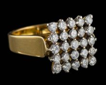 A diamond ring,: the square panel set with brilliant cut diamonds, approximately 1.