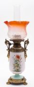 A French gilt brass and porcelain oil lamp: with cylindrical body with painted floral decoration,