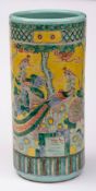 A Chinese yellow ground famille verte stick stand: painted with phoenix,