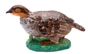 A French porcelain partridge cruet stand and cover: the bird naturalistically modelled and