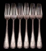 A set of five Victorian silver Bead pattern table forks, maker Thomas Stone Exeter, 1867: crested,