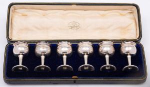 A set of six George V silver liquor tots, maker Goldsmiths & Silversmiths Co Ltd, London,