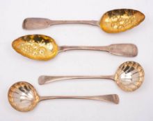 A pair of George III fiddle pattern and later decorated berry spoons,