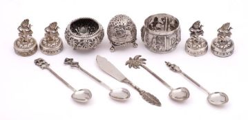 A mixed lot of Burmese and Indo-Persian silverwares: includes menu holders, napkin ring, salt,