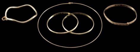 A gold coloured bangle,: the hinged bangle of waved design, stamped 375, 6.4cm wide, 9.