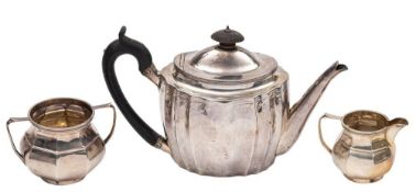 A mixed lot of silver tea wares: includes a George III silver teapot, maker John Riley, London,