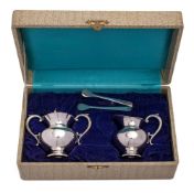 A 20th century sterling silver part tea service, stamped sterling 950: includes a cream jug,