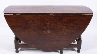 A William and Mary or Queen Anne oak gateleg dining table, circa 1700,