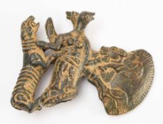 An Uzbekistan bronze age style ceremonial shafthole axe head: decorated with a bird headed demon,