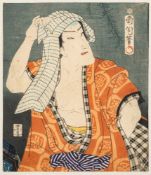 Toyohara Kunichika (1835-1900) a coloured woodblock print: depicting a Kabuki actor in dramatic