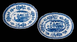 A matched pair of Derby blue and white tureen stands: of shaped oval form,