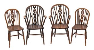 A composed set of six oak, ash, elm and beech wheel and spindle back chairs,