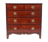 A Regency mahogany chest of drawers, circa 1815,: the top with reeded front and side edges,