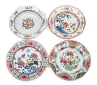 A group of four Chinese famille rose plates: brightly enamelled with cockerels,