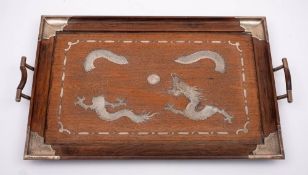 A Chinese hardwood and silver mounted twin handled serving tray: of rectangular outline decorated