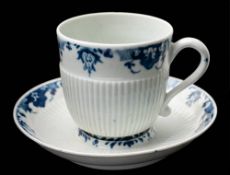 A First Period Worcester blue and white trembleuse coffee cup and saucer: of semi-reeded form in