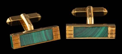 A pair of 18 carat gold malachite cufflinks,: the rectangular panels set with malachite,