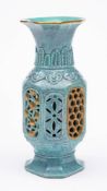 A Chinese robin's egg reticulated vase: of octagonal section with reticulated panels, part gilded,