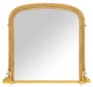 A Victorian giltwood and composition framed shallow arched overmantel mirror,