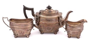 An Edward VII silver three-piece tea service, maker Thomas Bradbury & Sons, Sheffield,