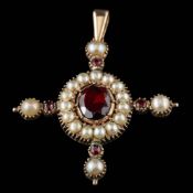 A garnet and pearl pendant,: the central oval cut garnet within a surround of cultured pearls,
