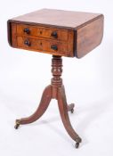 A Regency mahogany drop leaf work table,: early 19th century, the top with reeded edges,