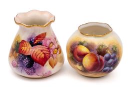 Two Royal Worcester porcelain vases: one of tapering form with frill rim painted by M.