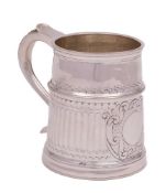 An early 20th century Britannia silver mug, maker John Hunt, London, date letter worn,