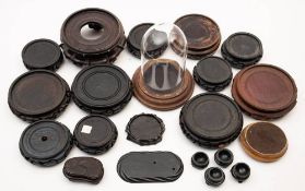 A collection of Chinese and Oriental wood stands: together with a glass dome with stand.