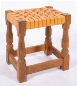 Workshop of Robert 'Mouseman' Thompson (Kilburn), an English oak stool,