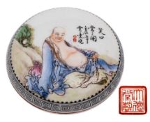 A Chinese porcelain seal paste box and cover: of circular form decorated in famille rose enamels