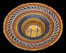 An Italian Umbrian maiolica broad-rimmed bowl, probably Deruta: with wide upturned rim,