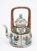 A Chinese famille verte wine pot and cover: with overhead 'bamboo' handle,