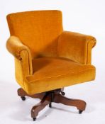 An upholstered and metal mounted swivel tub armchair, mid 20th century,