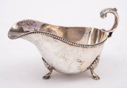 A George V silver sauce boat, maker Mappin & Webb, Sheffield, 1915: of traditional design,