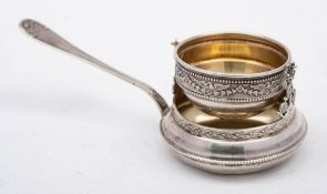 A continental silver tea strainer and stand,